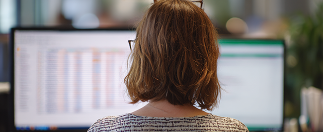 An FCC professional working on her taxes